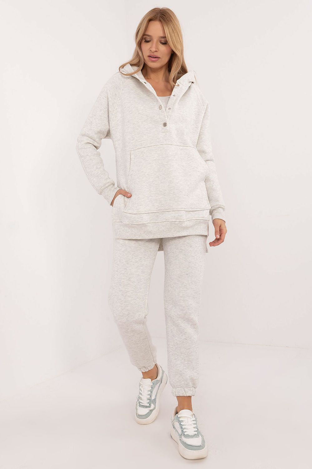 Grey mélange loungewear set for women with T-shirt, hoodie, and joggers.