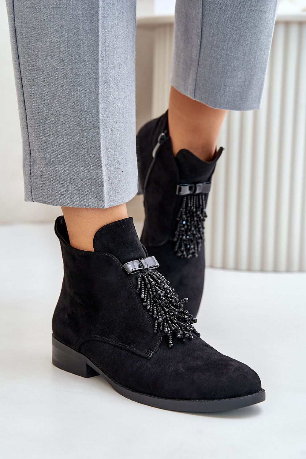 Tassel Top Ankle Bootie in Black – Front View 2