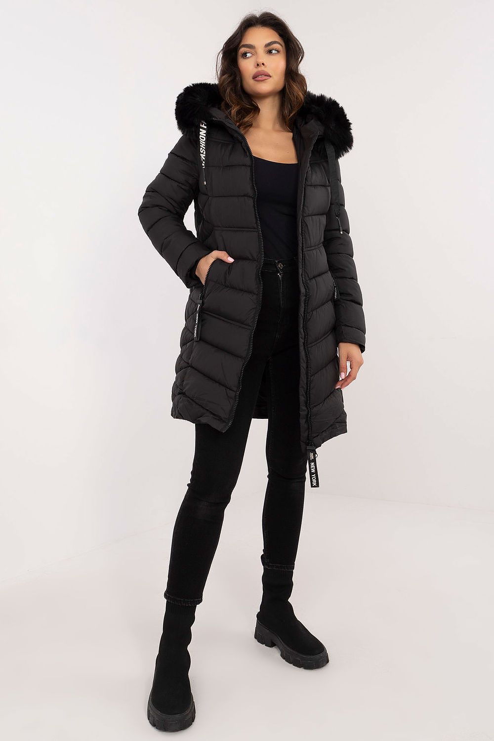  Black quilted winter jacket with detachable fur and drawstring hood.