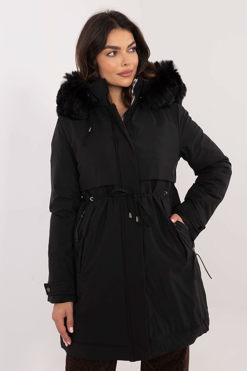  Black quilted winter jacket with waist belt and faux fur hood.