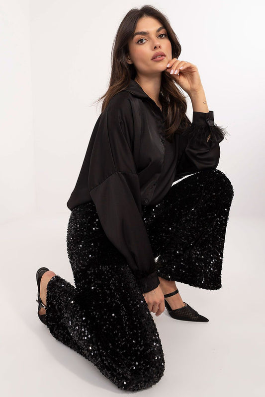 Black sequin trousers front view on mannequin – elegant high-waisted straight-leg design. 