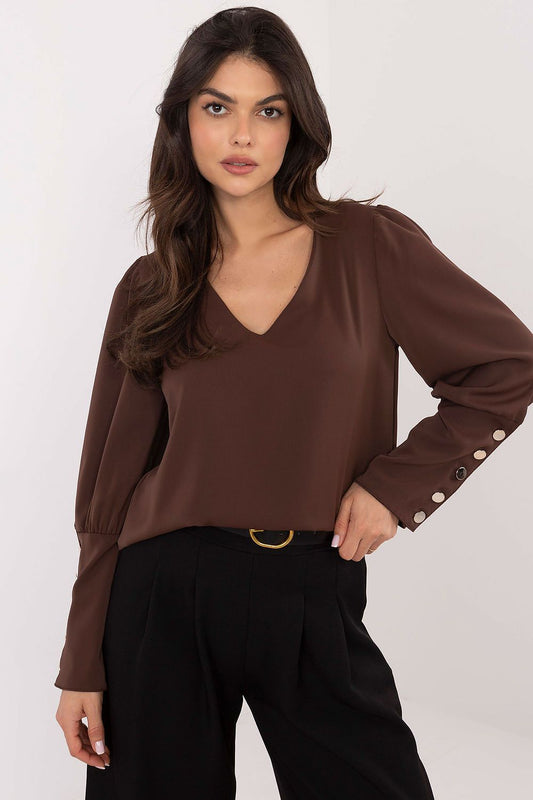 Front view of brown blouse showing minimalist, formal style.