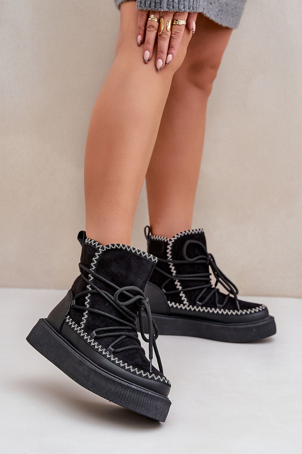Glacier Charm Platform Snow Boots in Black – Front View 1 