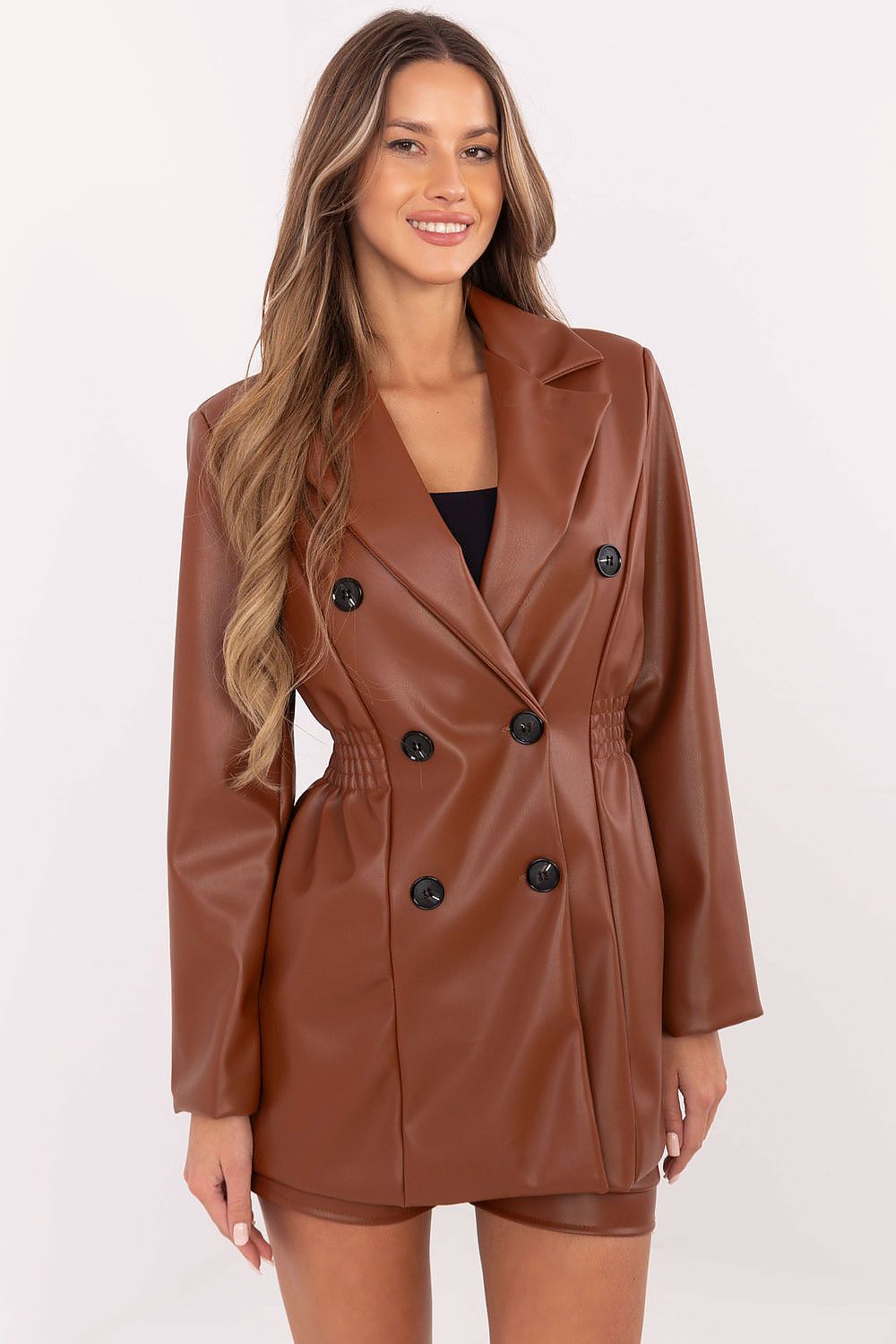  Front view of women’s eco-leather double-breasted blazer jacket with wide lapels.