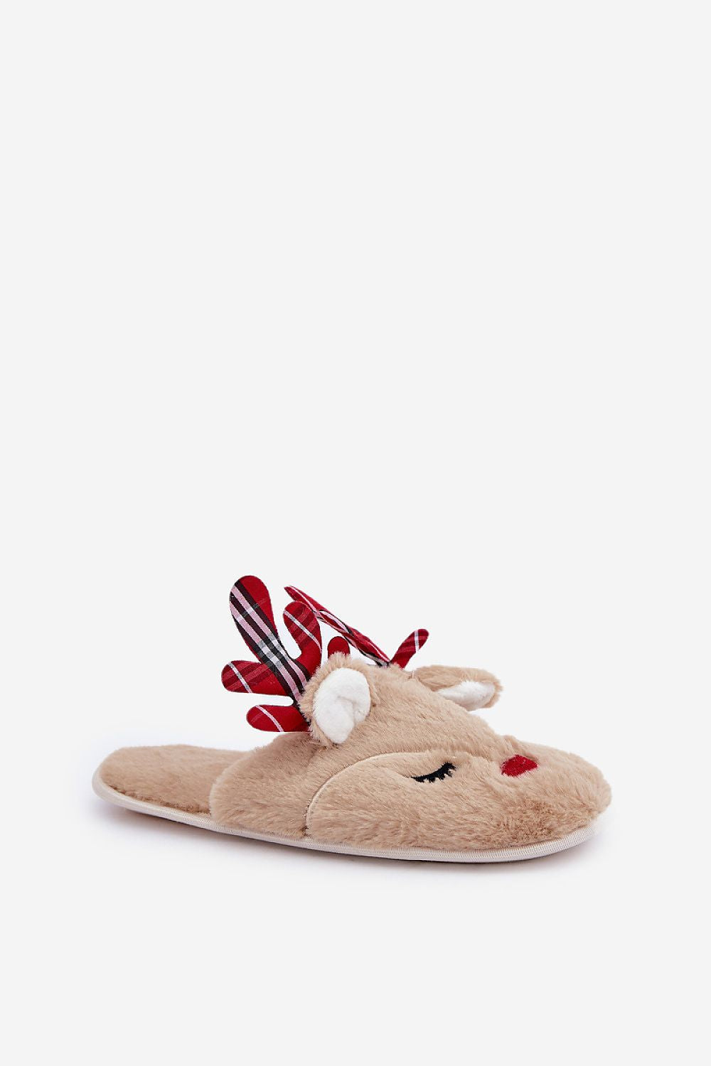 Beige slippers with reindeer design on a white background