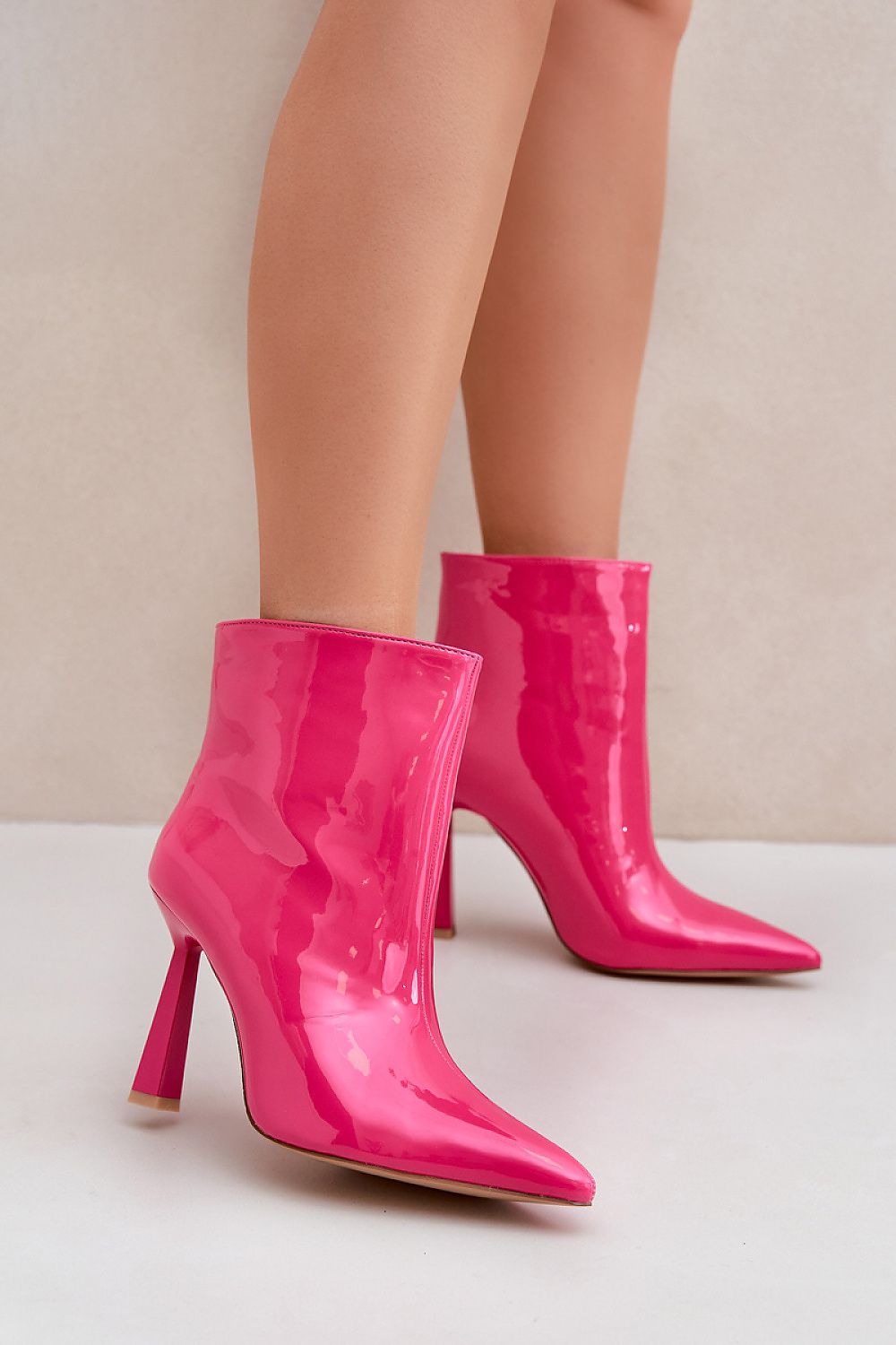 Sleek Gloss Patent Ankle Boots in Pink – Front View 1