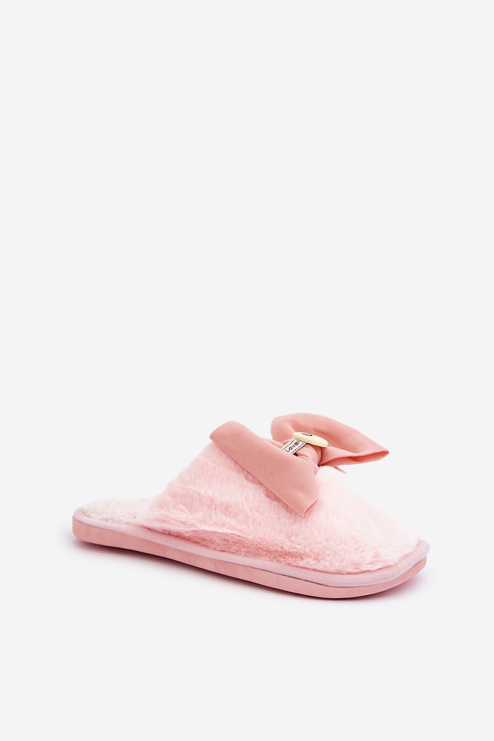 Pink slipper with a strap on a white background