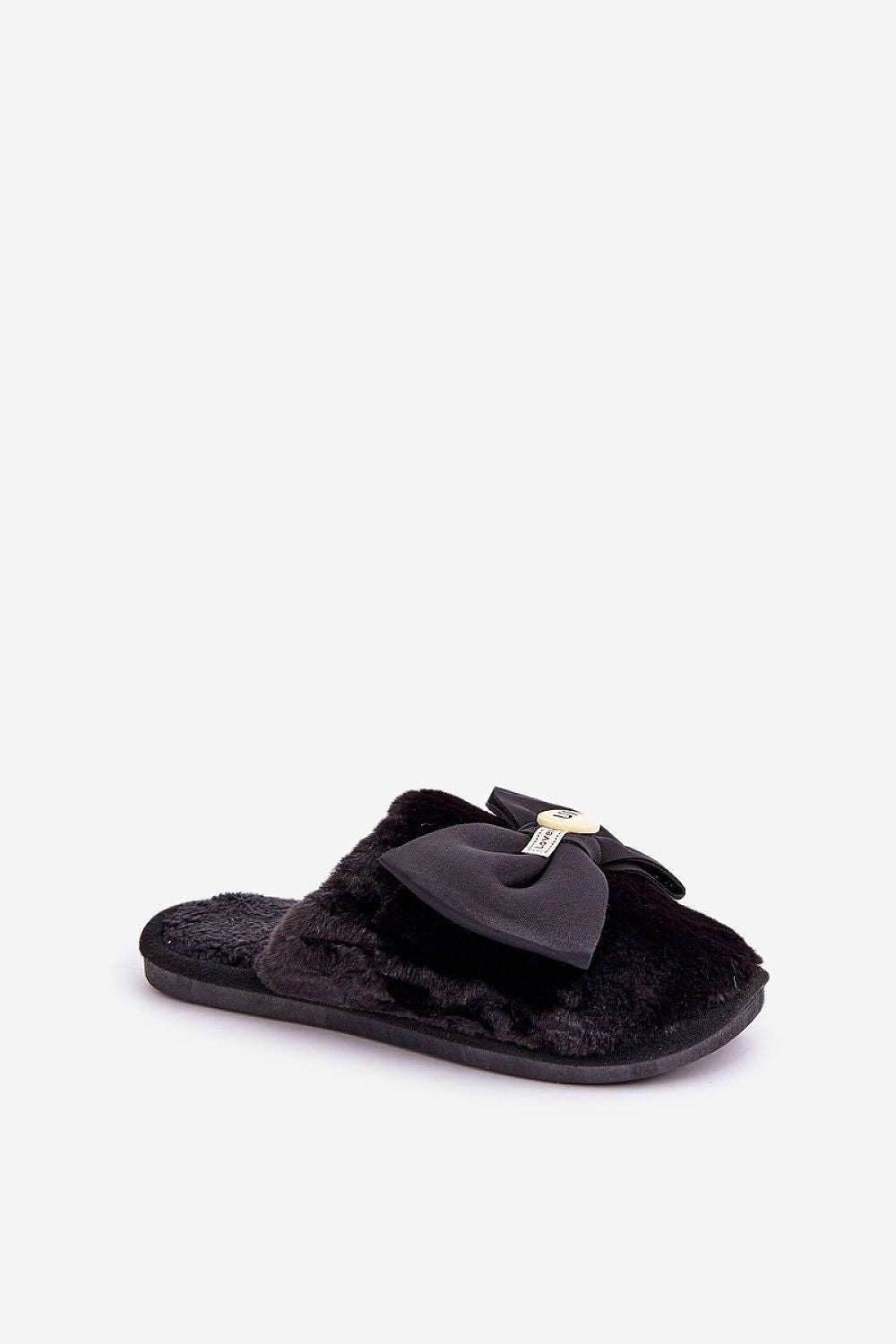 Black slipper with a bow on a white background