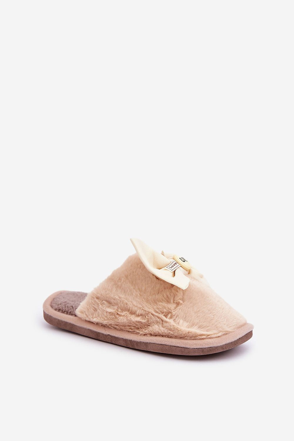 Beige slipper with a bow on a white background