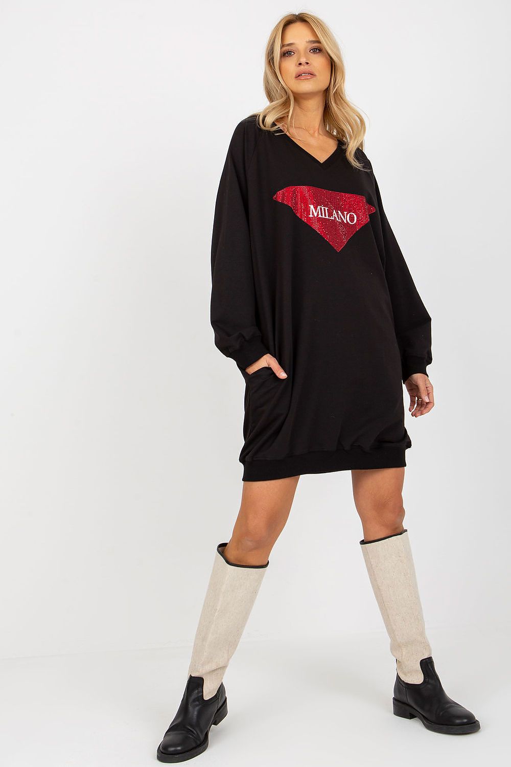  Lifestyle shot-2 of woman wearing black long sweatshirt outdoors, showcasing casual elegance.