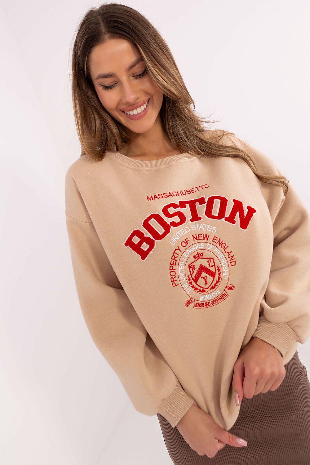  Beige women’s sweatshirt with eye-catching front print.