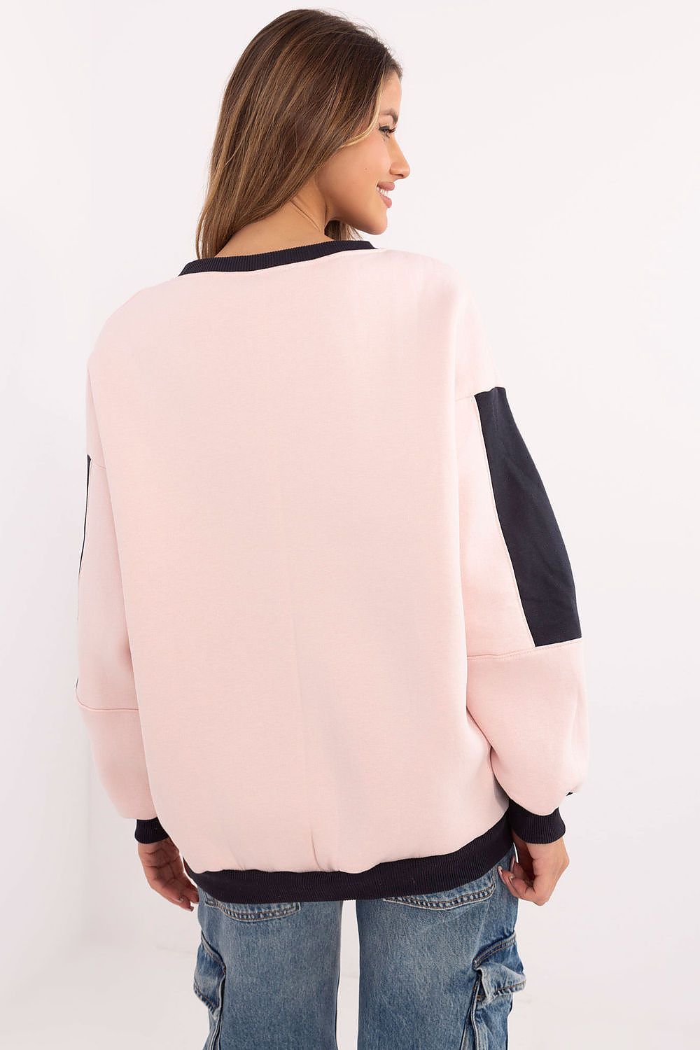 Cozy pink sweatshirt for women, insulated and soft for colder days.
