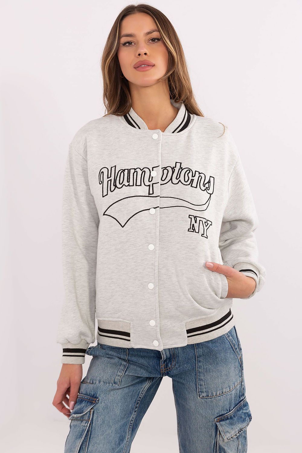 Grey women’s bomber jacket with contrast stripes on cuffs and embroidered design.