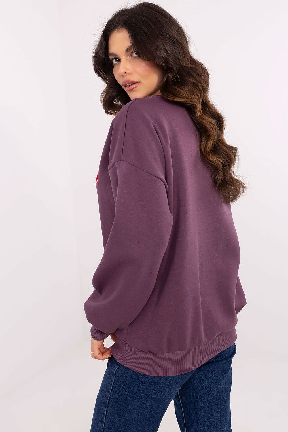  Violet women’s sweatshirt with front print and patches.