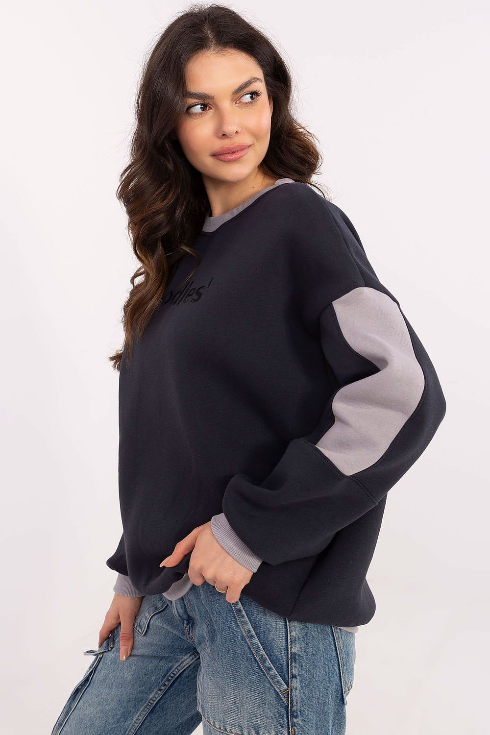Stylish black pullover sweatshirt with round neck and decorative patches.