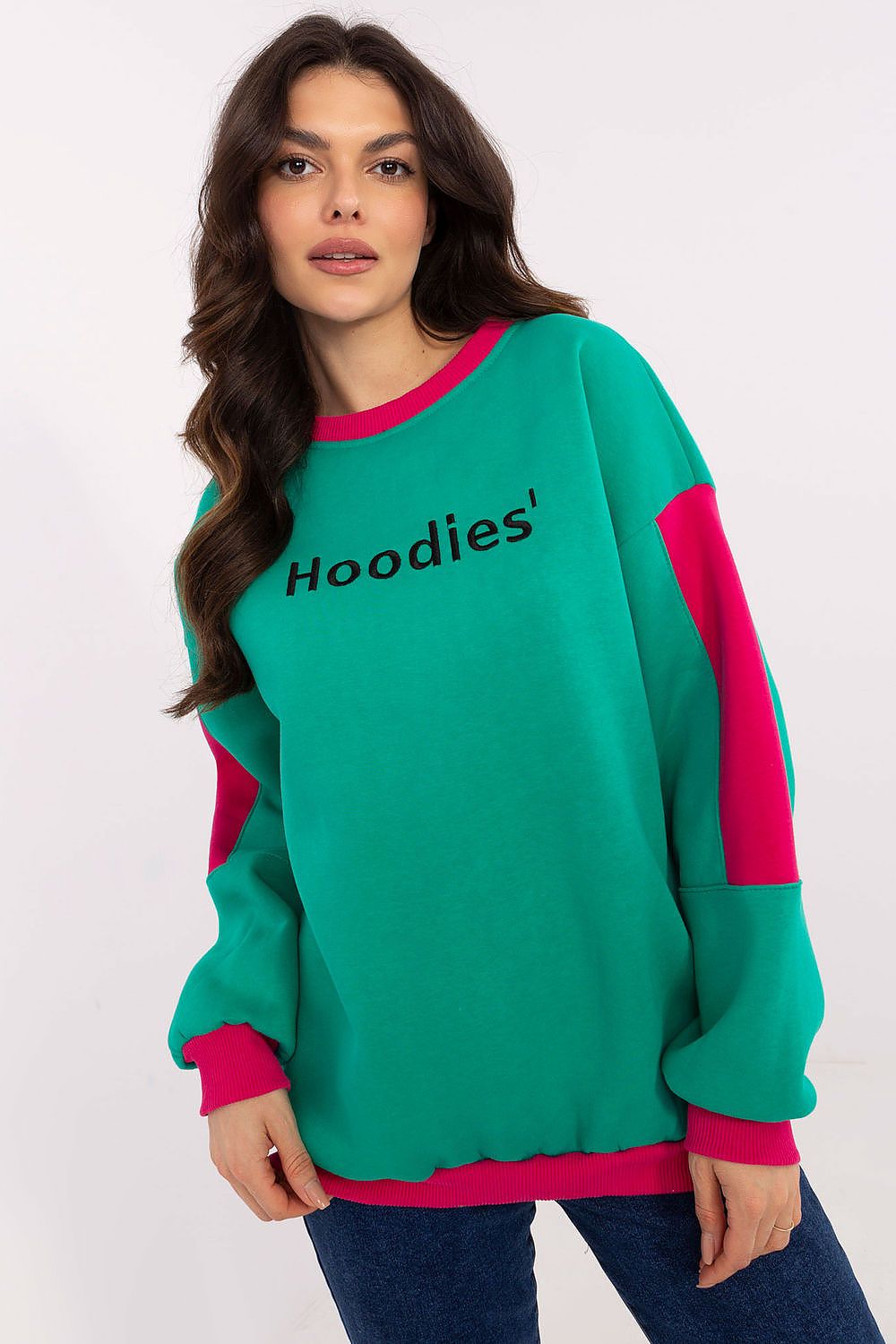 Green women’s sweatshirt with embroidery and round neckline, front view.