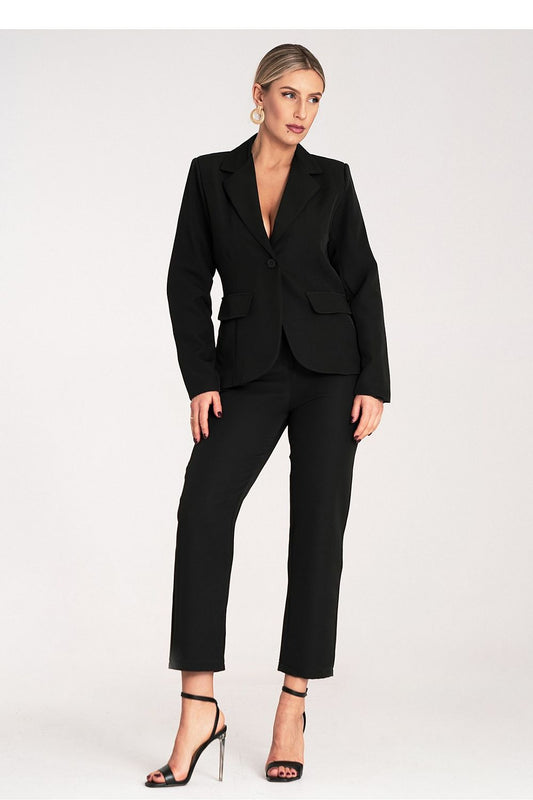 Woman wearing a black suit on a white background