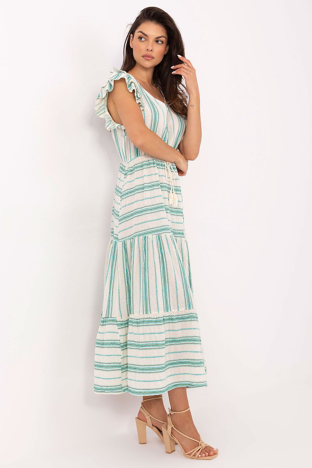 Woman wearing a striped dress on a white background