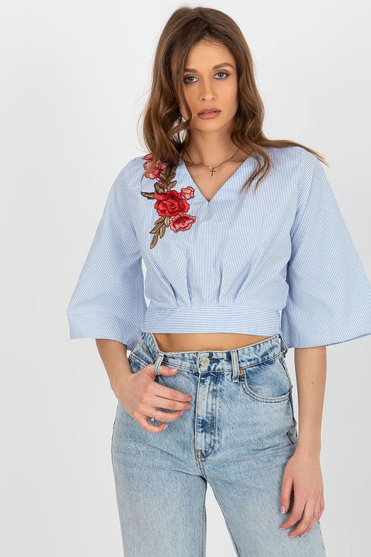  “Cotton Bloom Blouse in Blue with sweetheart neckline, front view”