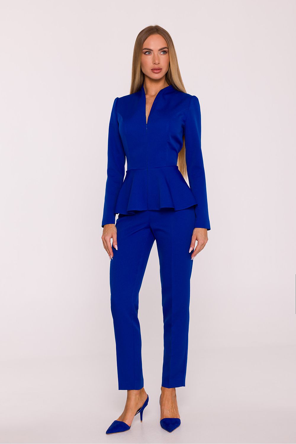 Woman wearing a blue suit on a white background