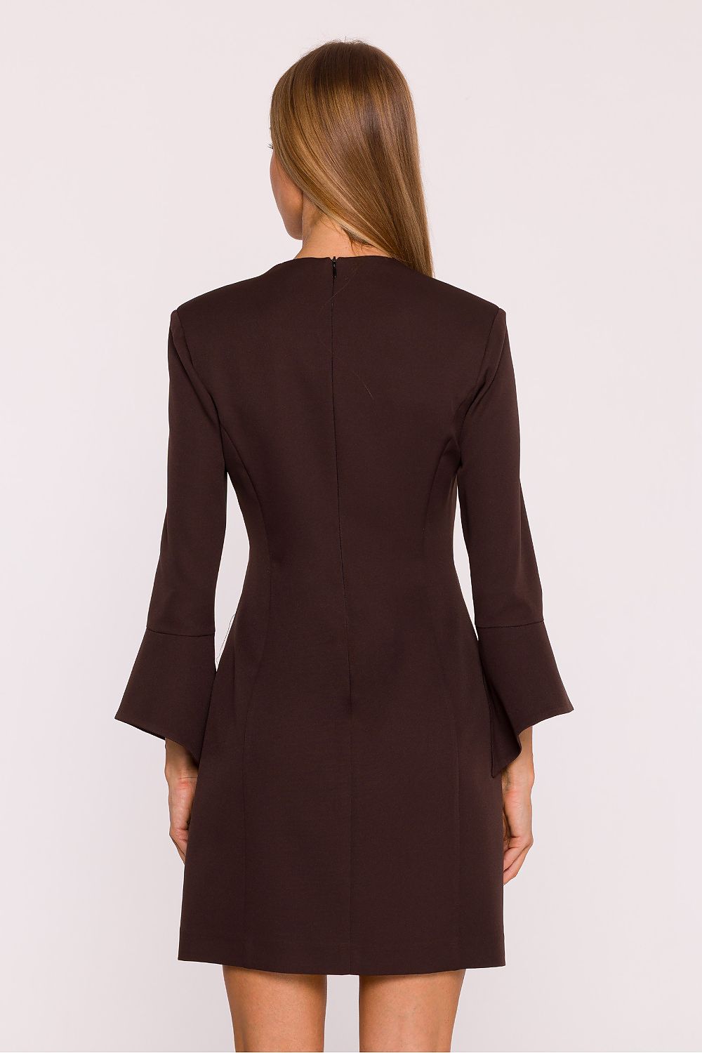 Brown dress worn by a model on a white background