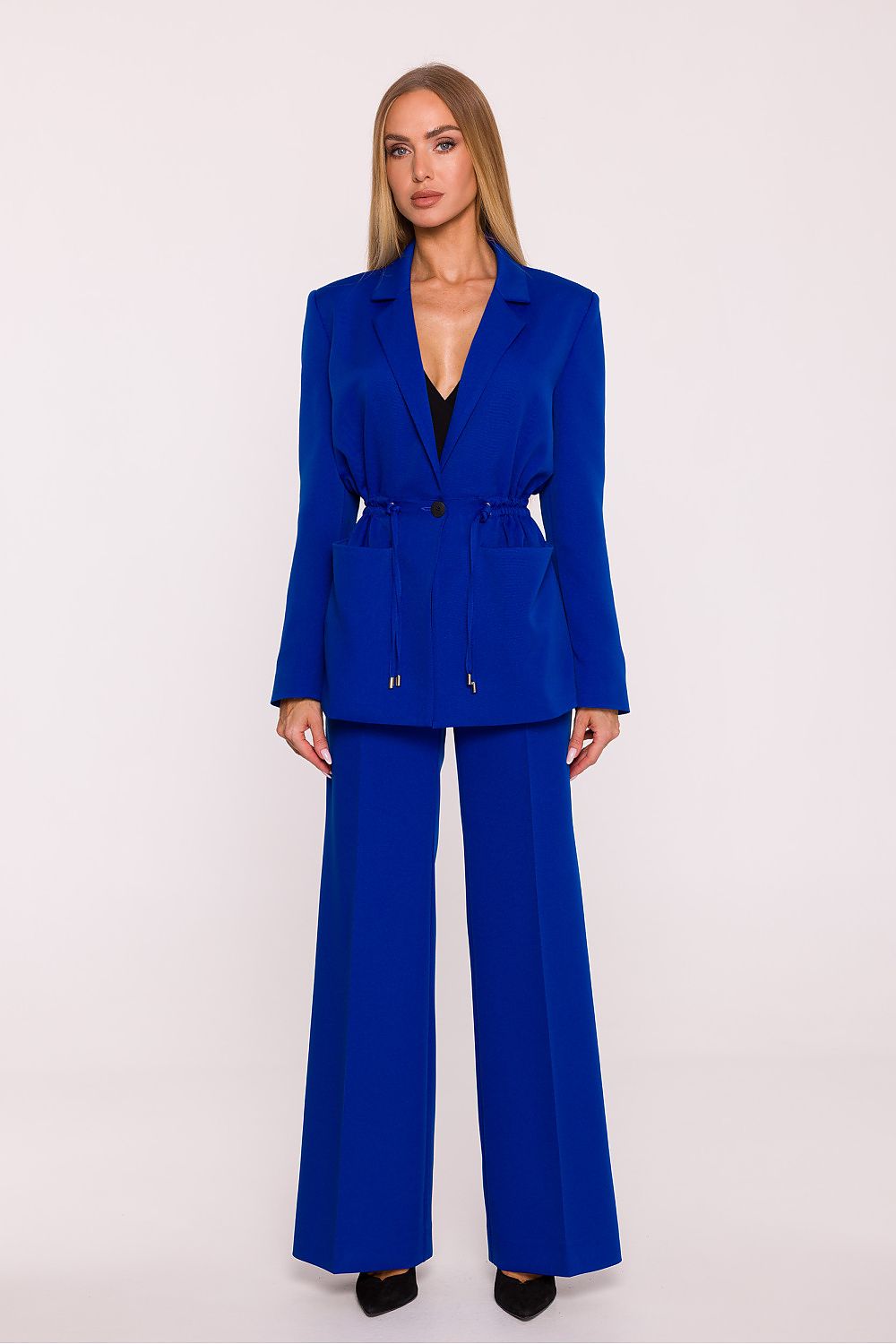 Woman wearing a blue suit on a white background