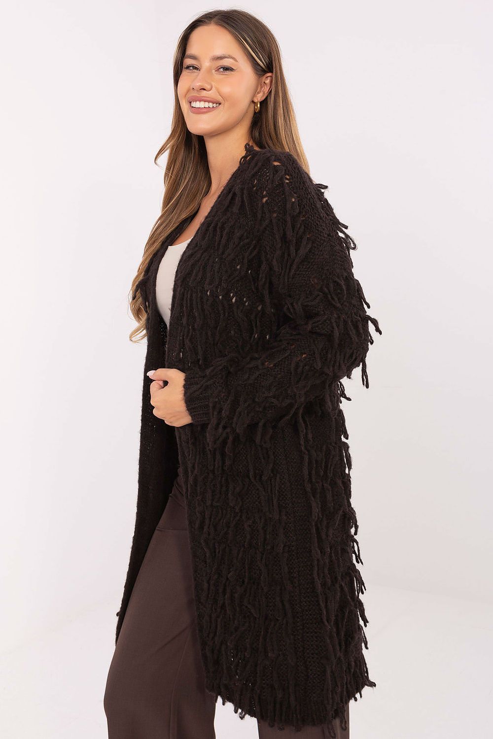  Side view of brown open-front cardigan showing textured fringes.