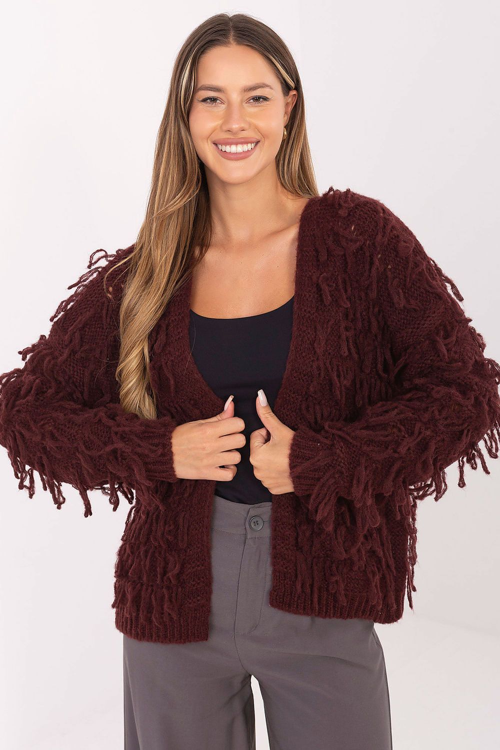 Women’s red boho knit cardigan with fringes, open-front layering sweater.
