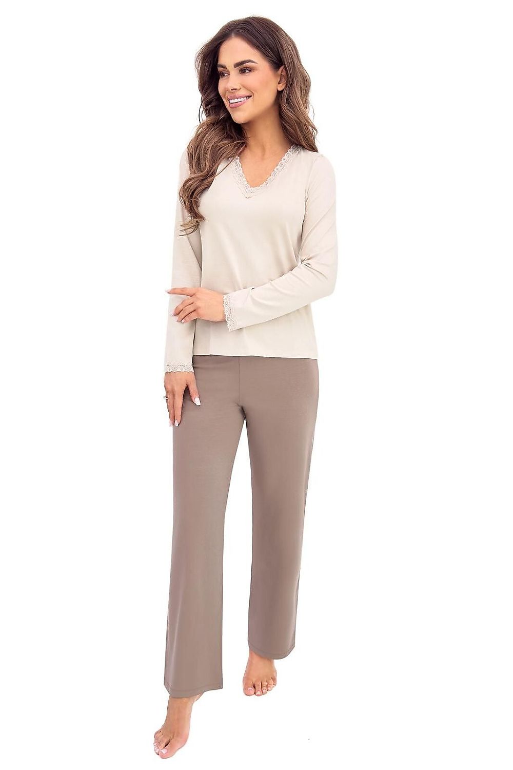 Elegant beige two-piece pyjamas featuring a long-sleeved top and comfortable elasticated waist bottoms
