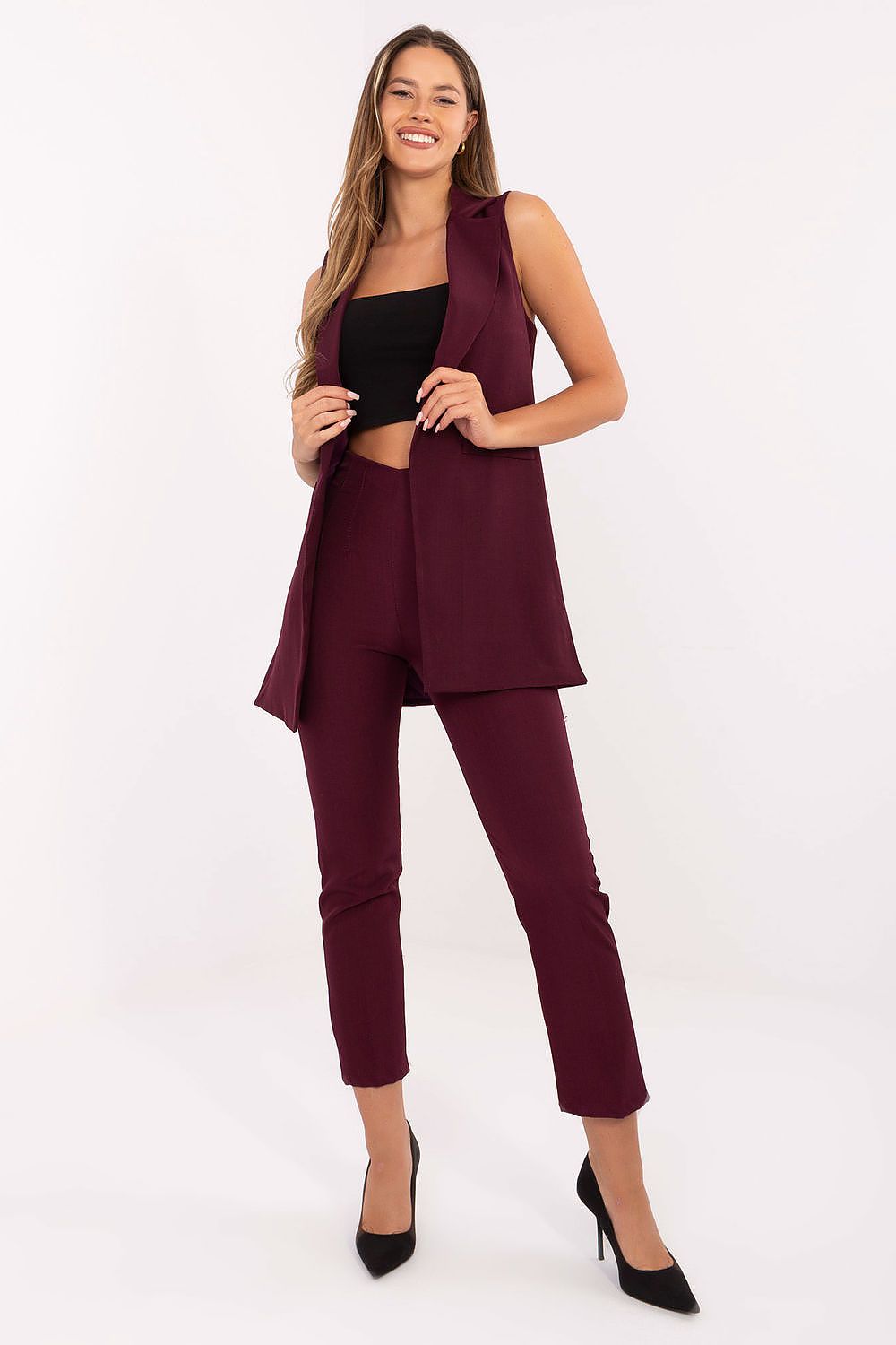  Front view of red tailored sleeveless gilet with lapels and front pockets. 2