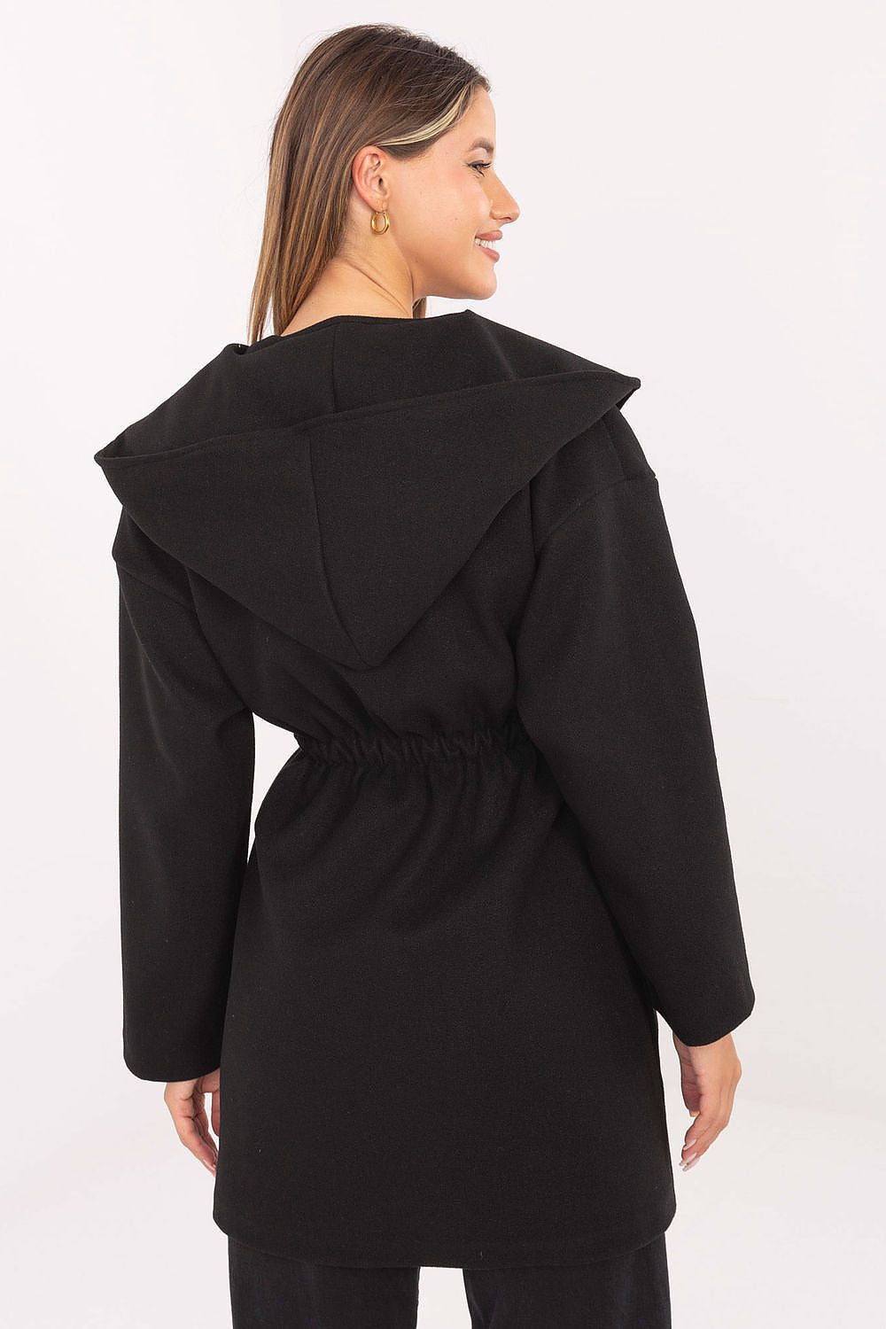 Back view of black hooded coat highlighting hood and relaxed fit.