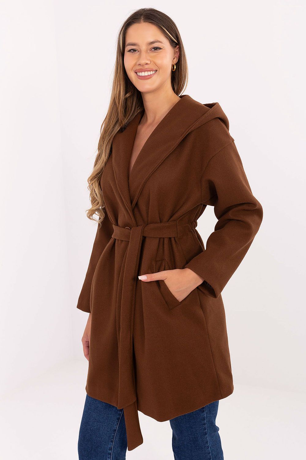  Side view of brown coat showing relaxed fit and hood.