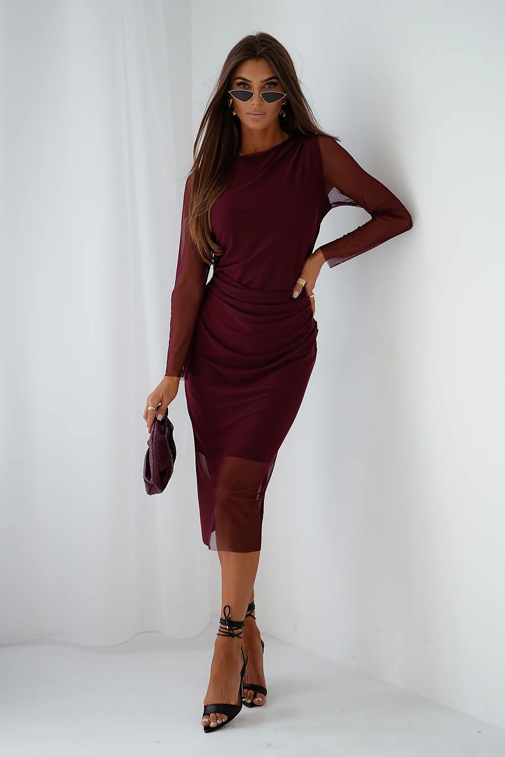 Red women's tulle detail dress styled for an elegant occasion-full view