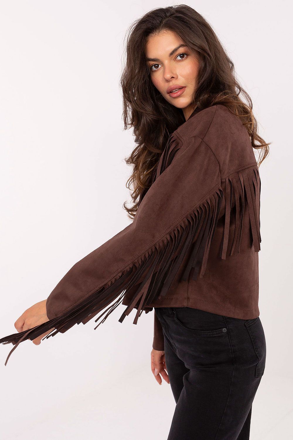 Brown jacket sleeve and fringe detail close-up