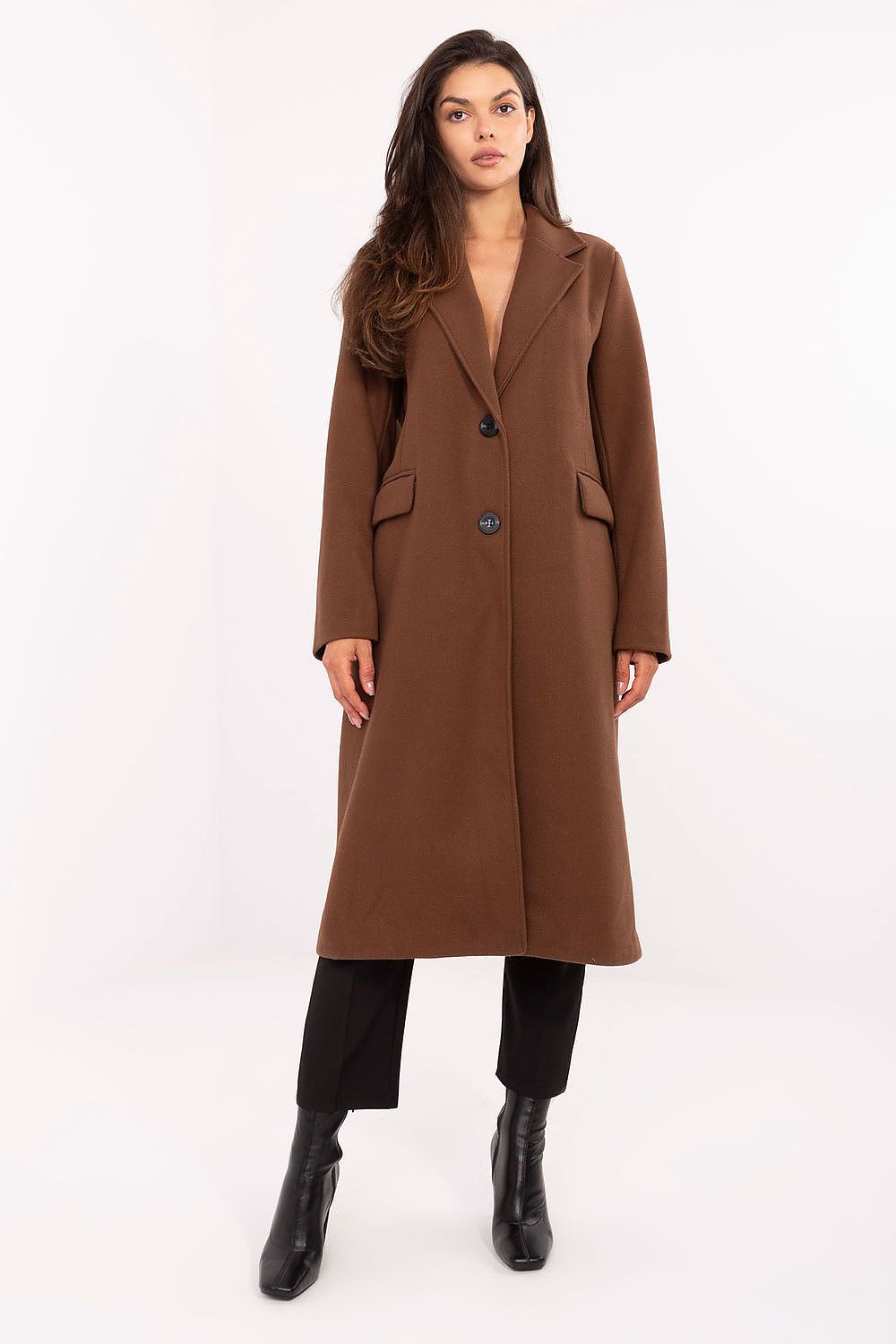 Woman wearing a brown coat on a white background