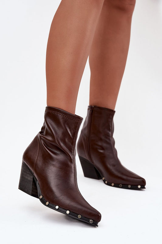 Front view of Raven Women’s cowboy boots in brown with pointed toes and block heel.