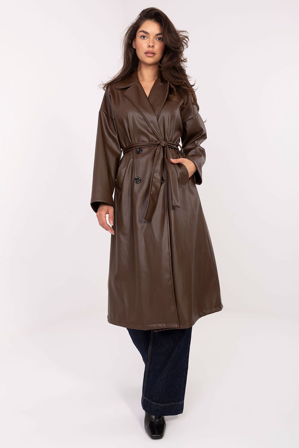  Front view of Celeste Women’s leather coat in brown with lapels and tie belt.