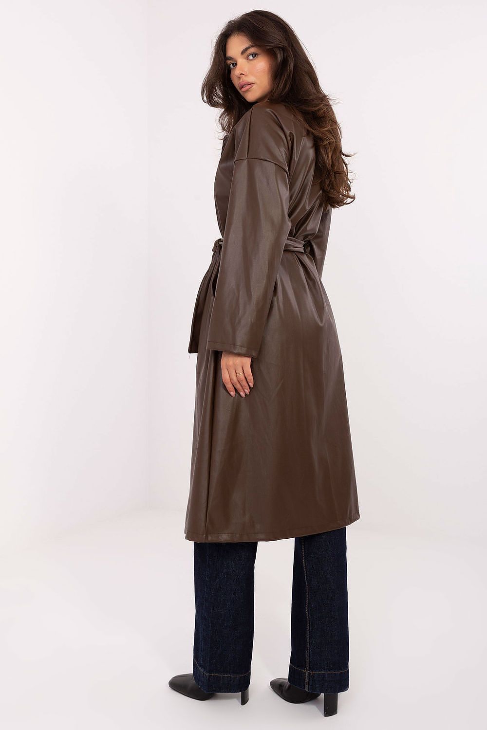 Back view of Celeste brown leather coat showing knee-length cut and waist belt.