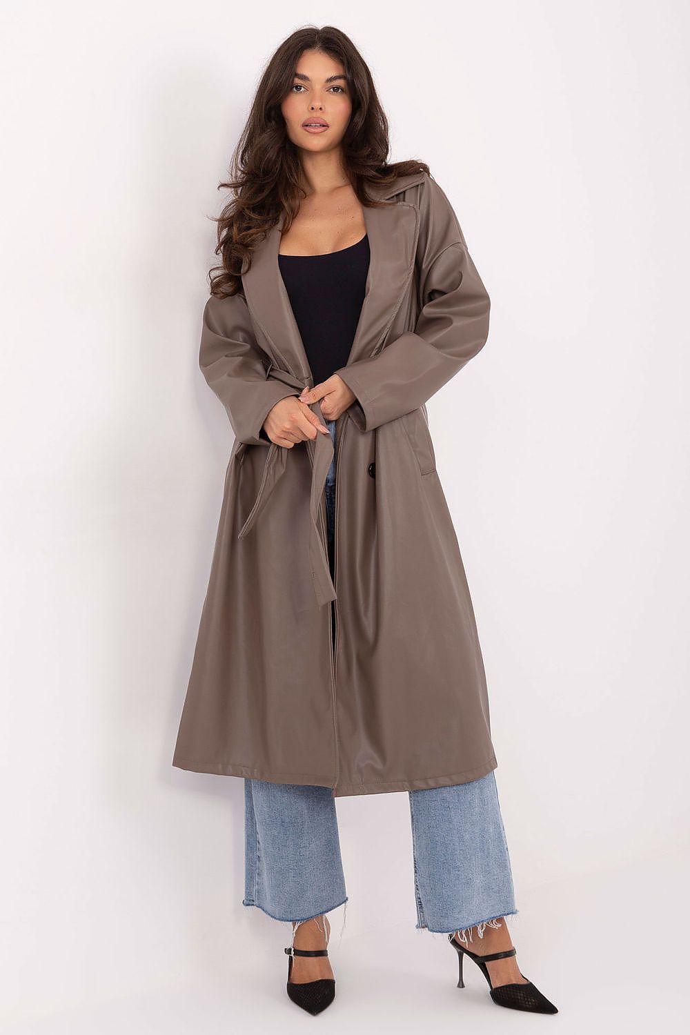  Front view of Celeste Women’s leather coat in beige with button closure and lapels.