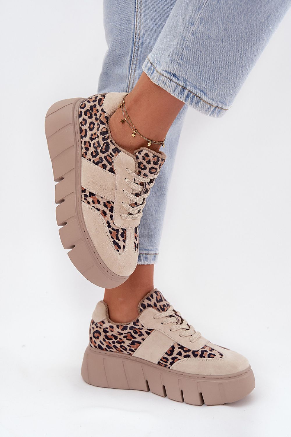 Side view – Close-up of platform sole and trendy leopard pattern.