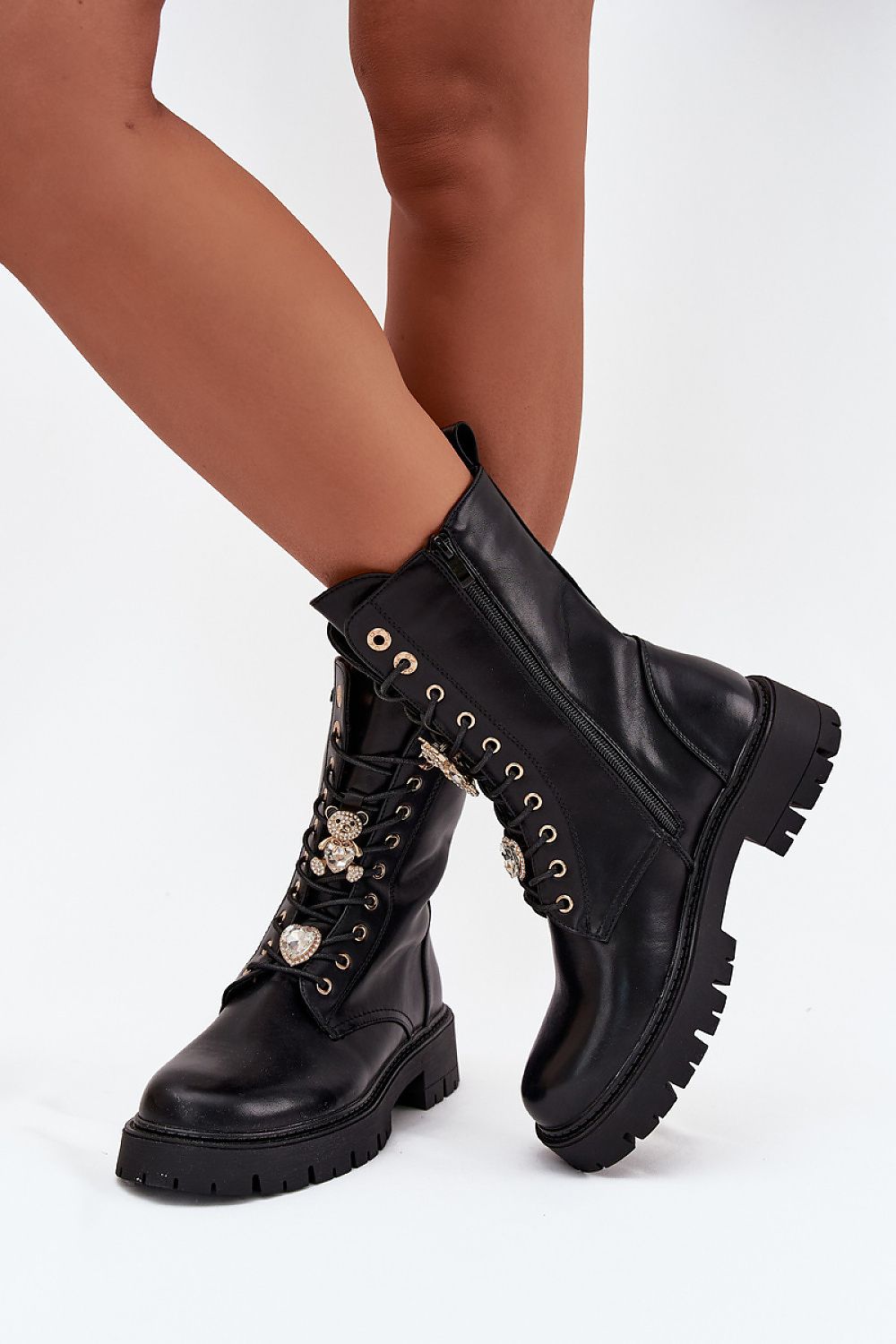Front view of Liora Women’s eco leather ankle boots with lace-up design and cute pins.