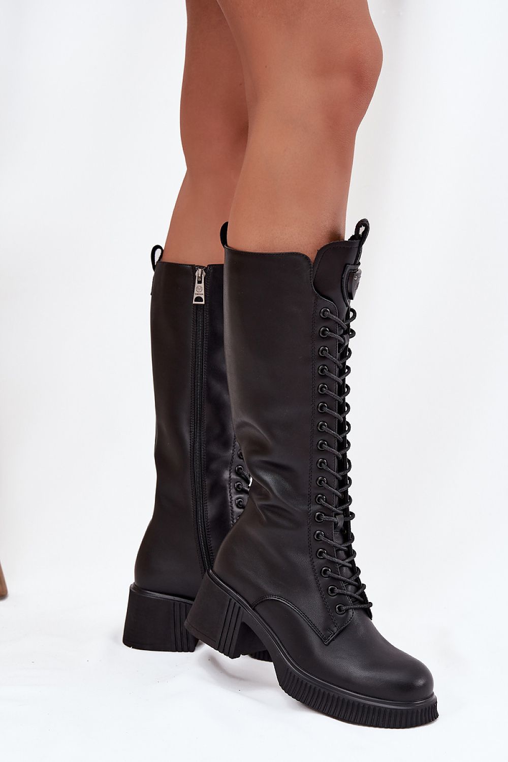  "Front view of Vinceza women’s real leather glan-style boots with full lacing, block heel, and sleek black finish."