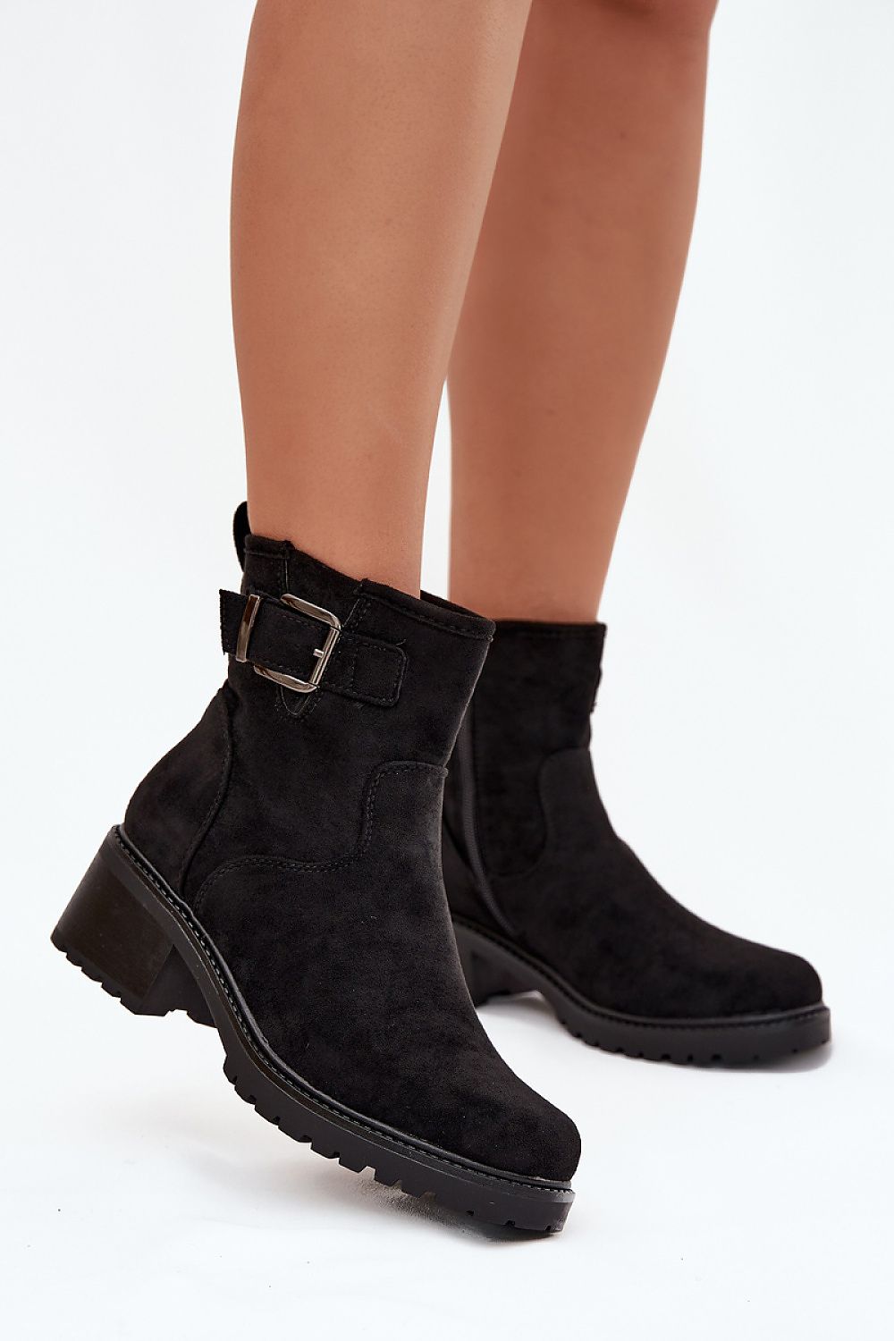 Front view – Women’s eco suede ankle boots with decorative buckle and block heel.