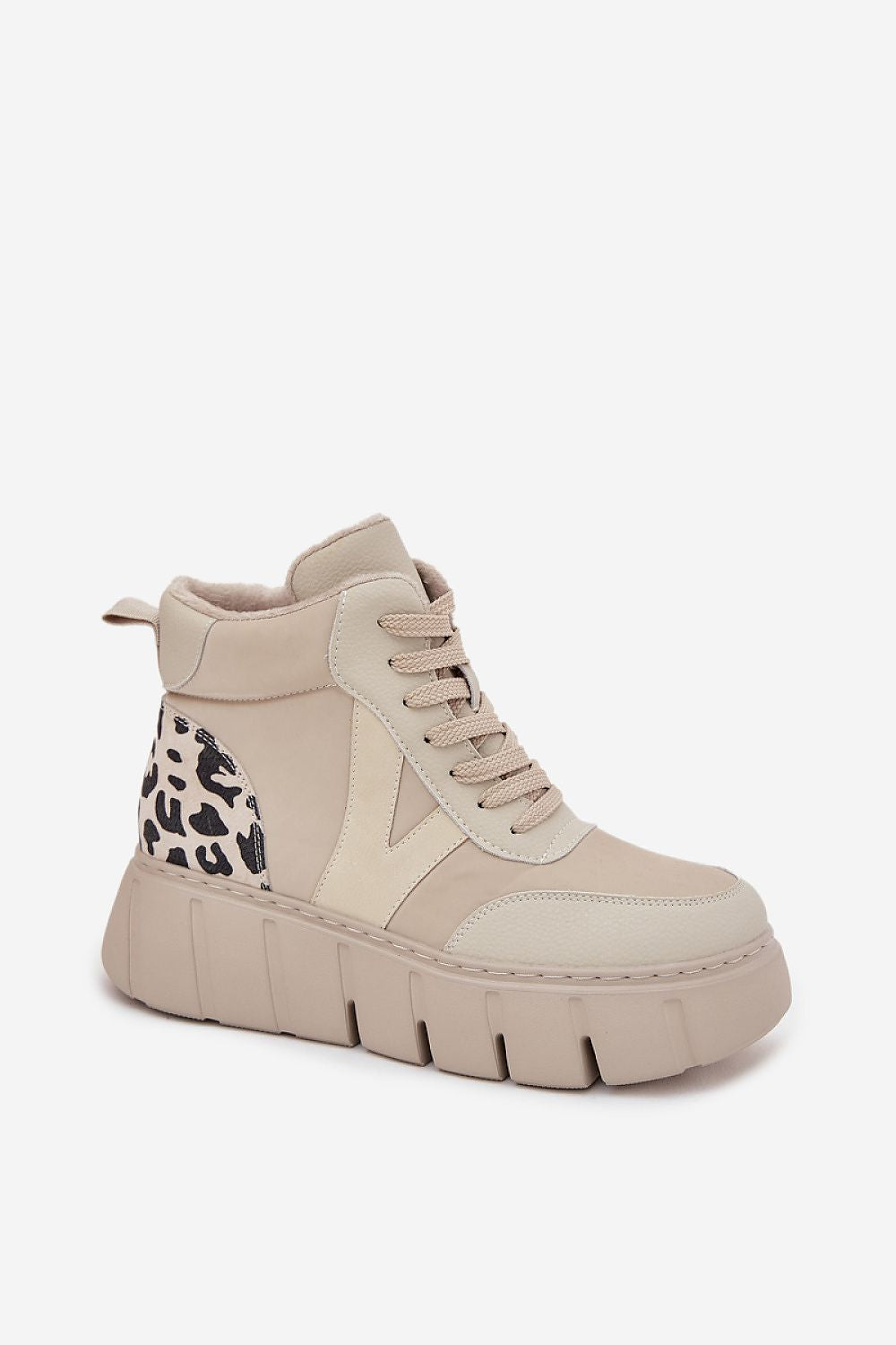 Women's natural leather ankle boots with laces – detail close-up.