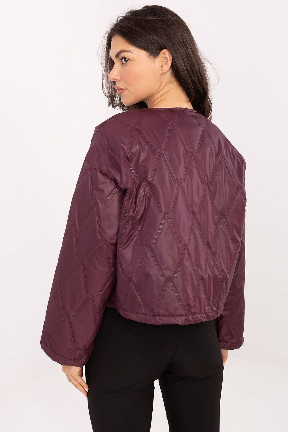 Back view of Selene Women’s quilted jacket showcasing modern collarless cut and elegant drape.