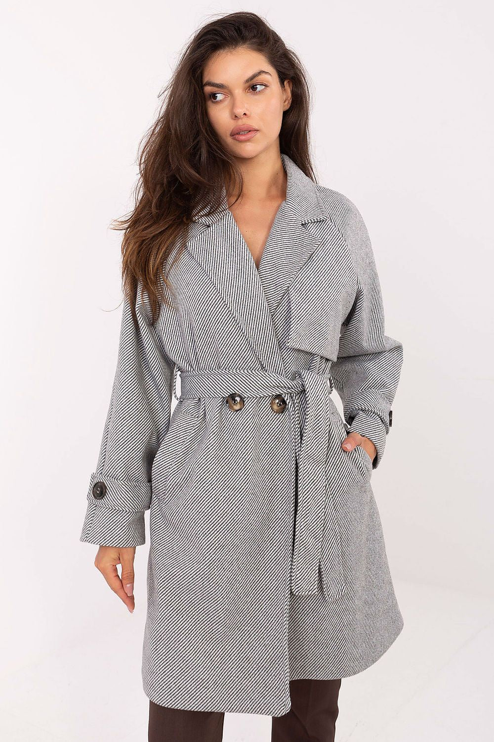  “Front view of Elara Women’s transitional coat with double-breasted buttons and tie waist belt, knee-length polyester outerwear.”