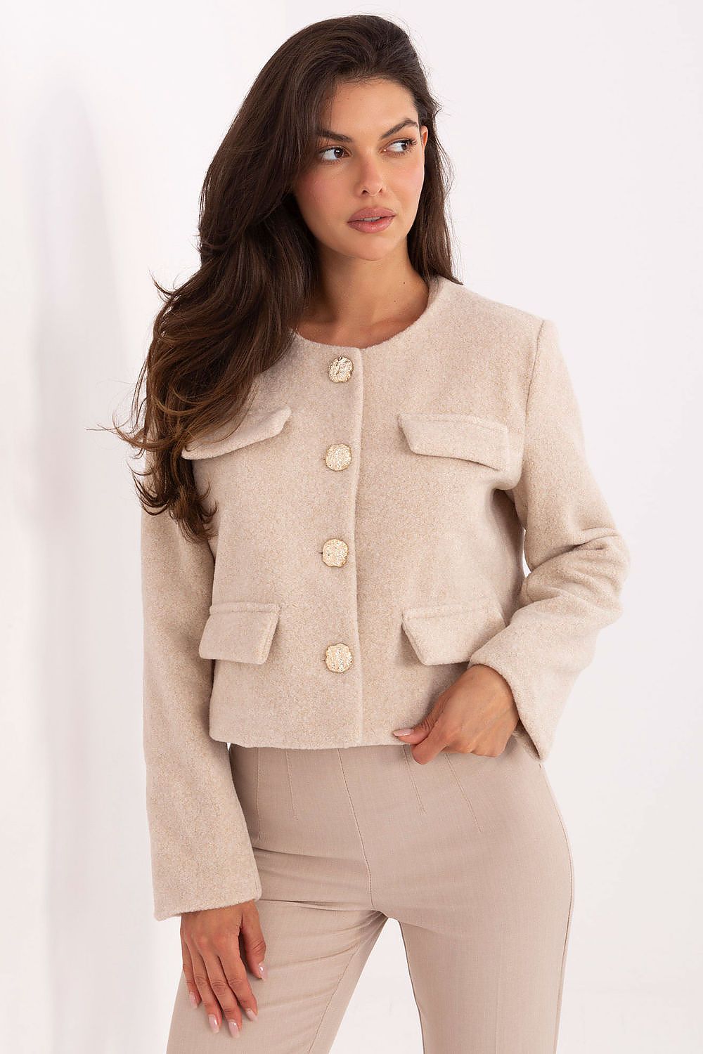 Front view of women’s short-cut jacket with button fastening and smooth pattern.
