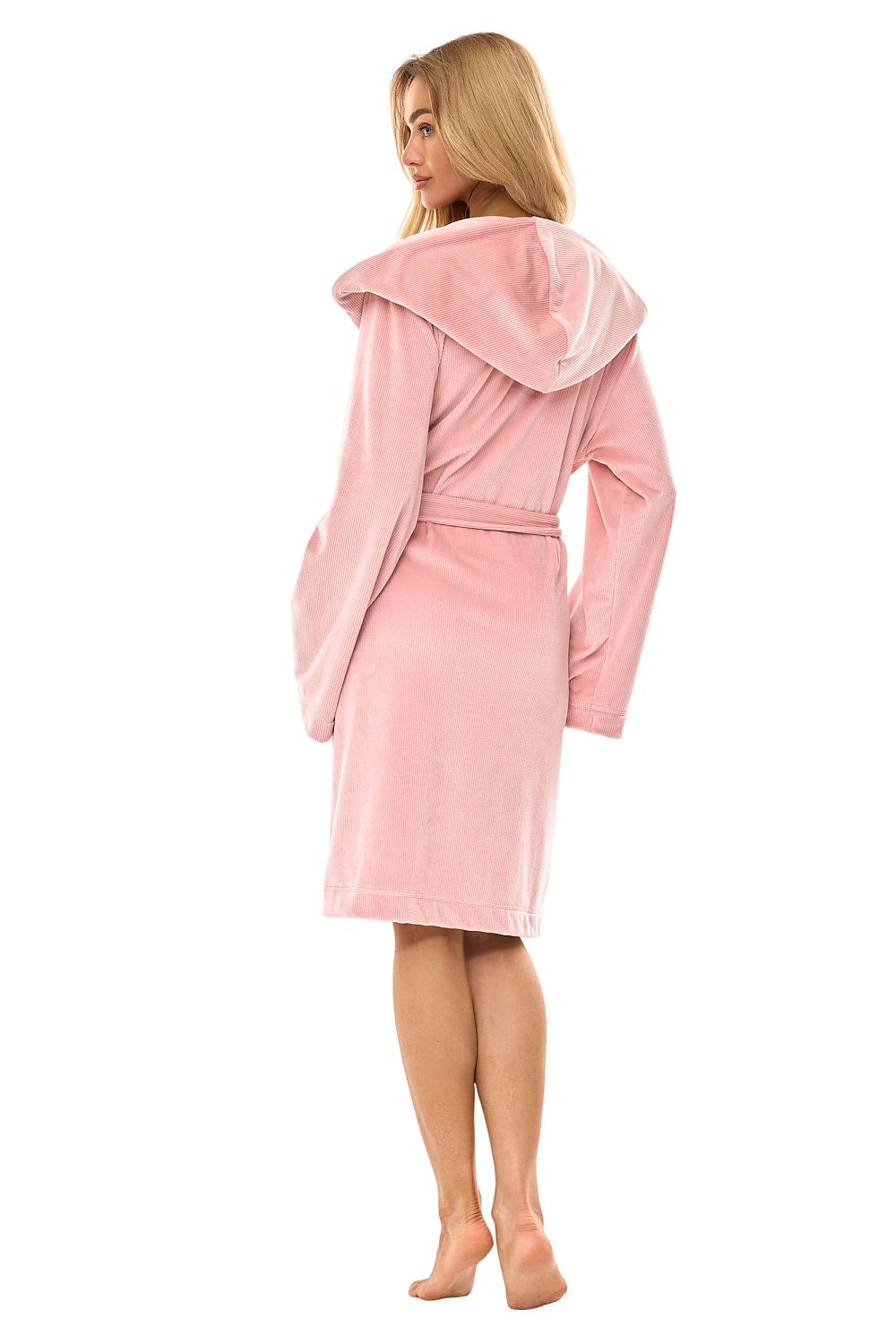 Woman wearing a pink robe on a white background