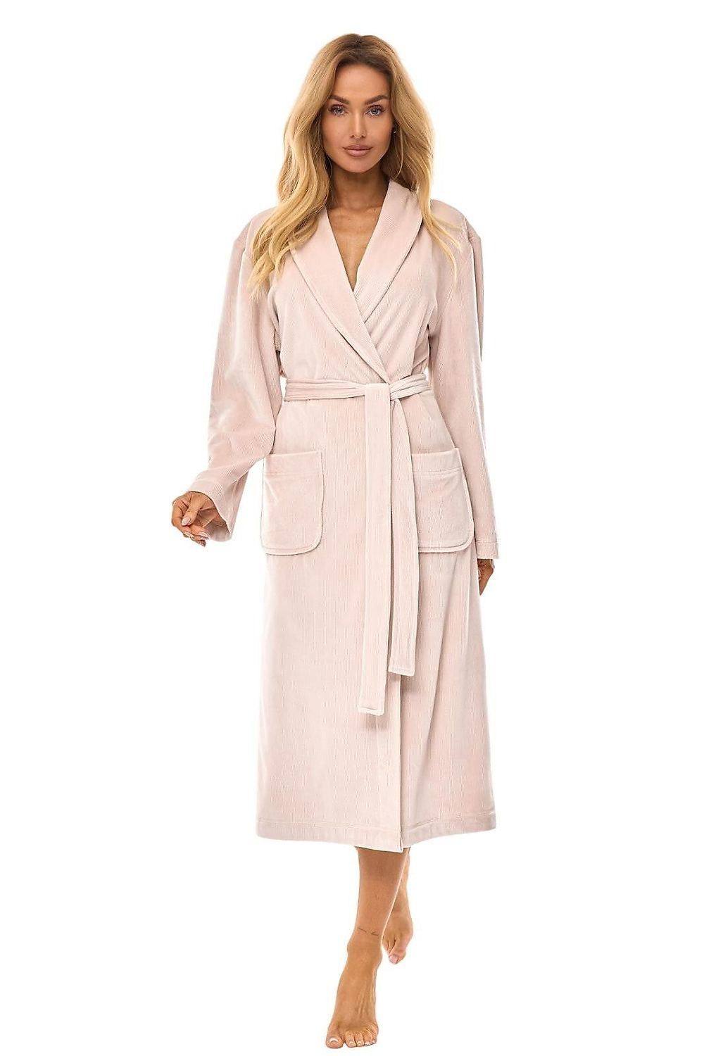 Woman wearing a light pink robe on a white background