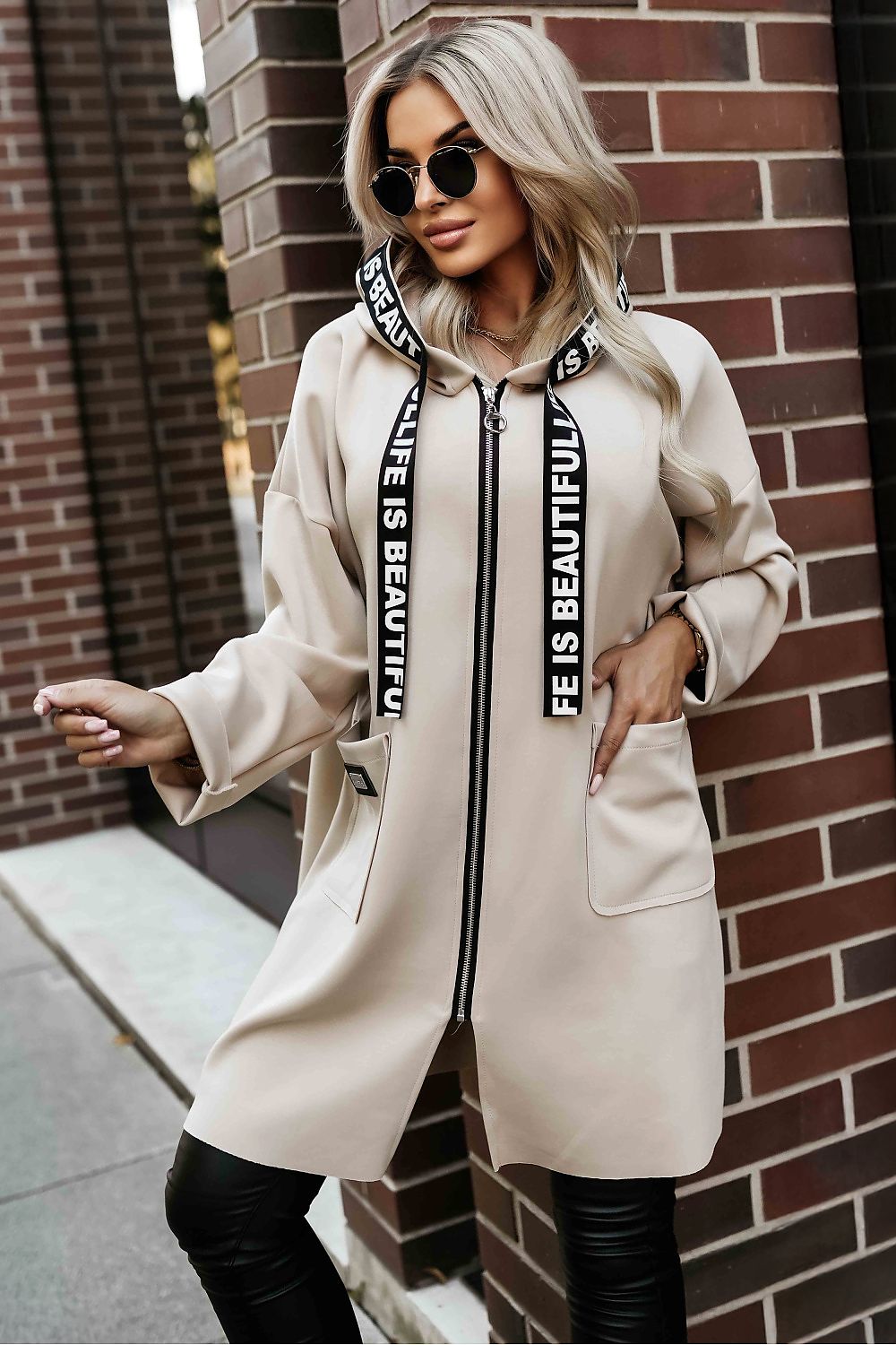 Front view 2 of beige Numoco Basic women’s hooded coat with drawstring detail.